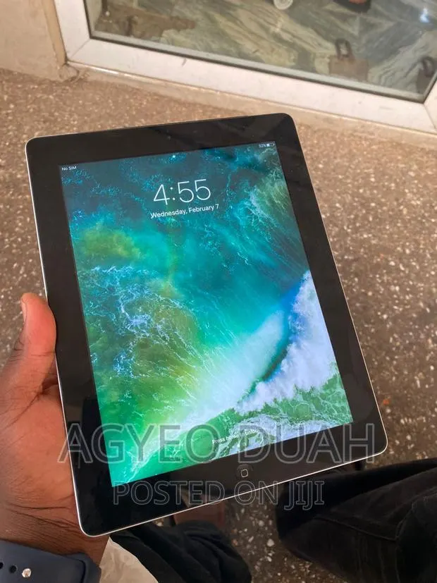 Apple iPad 4 Wi-Fi + Cellular 32 GB Silver · Photo 1