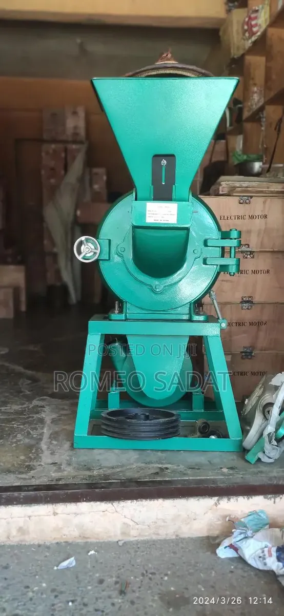 A Grinding Disk Mill Machine With 15hp Electric Copper Motor · Photo 1