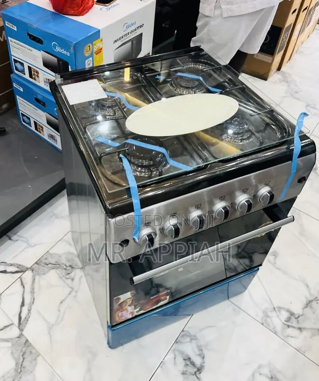 Super Classic Ferre 60x60cm Glass Lid 4 Gas Burner(Gray).. · Photo 1