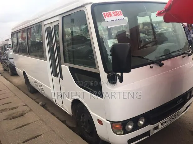 Toyota Coaster 2009 White · Photo 1