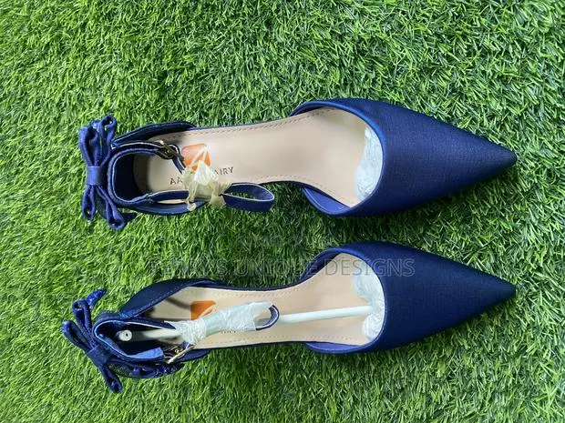 Midnight Elegance Bow-Tie Pointed Heels · Photo 1