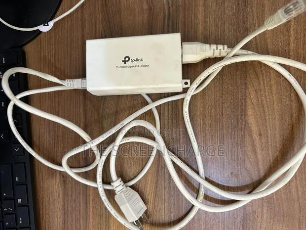TP Link Power Adapter · Photo 1