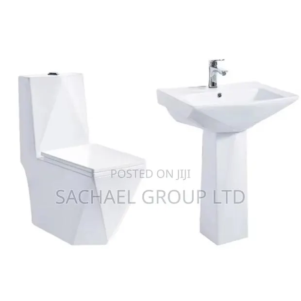 Elegant Wc With Pedestal Basin · Photo 1