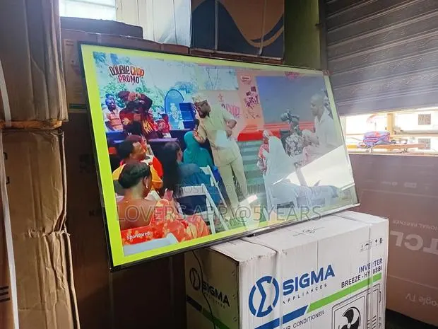 Turn Your Living Room Into a Theater – TCL 65inches Smart Tv · Photo 1