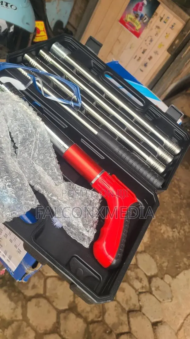 Nail Gun With Extended Pole for Ceiling Works · Photo 1