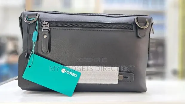 Coteci Portable Pouch Classic Business Men's Bag With Finger Print · Photo 1