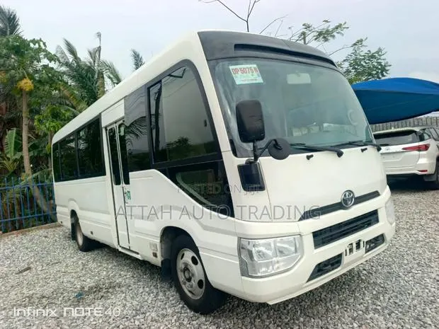 Toyota Coaster 2022 White · Photo 1