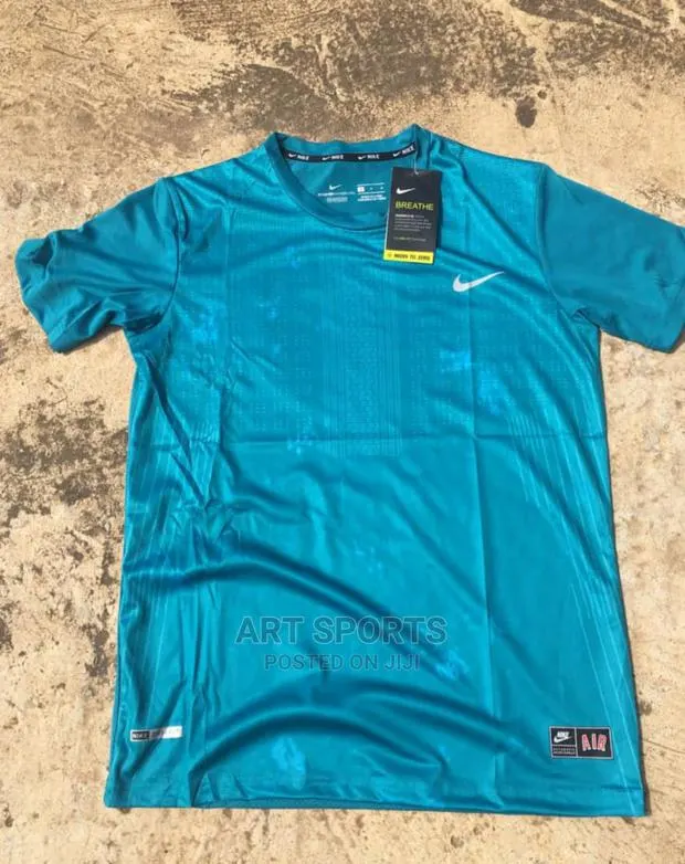 Nike Tops . · Photo 1