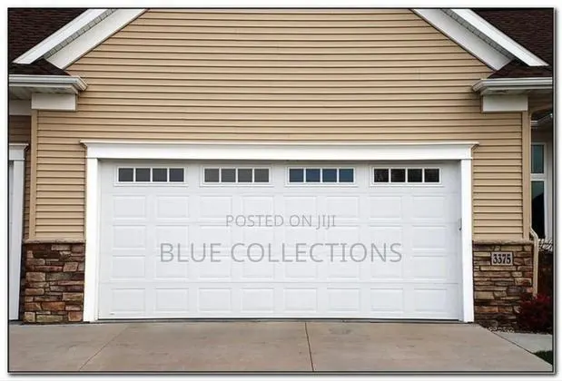 16×8 Garage Door With Fanlight · Photo 1