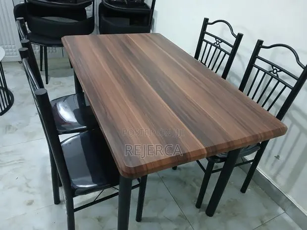 Wooden Dinning Table With 4 Chairs · Photo 1
