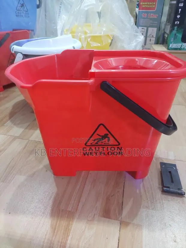 Red Plastic Mop Bucket With Caution Wet Floor Warning and Integrated · Photo 1