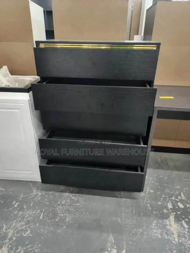 Gold And Black Drawers Cabinet · Photo 1