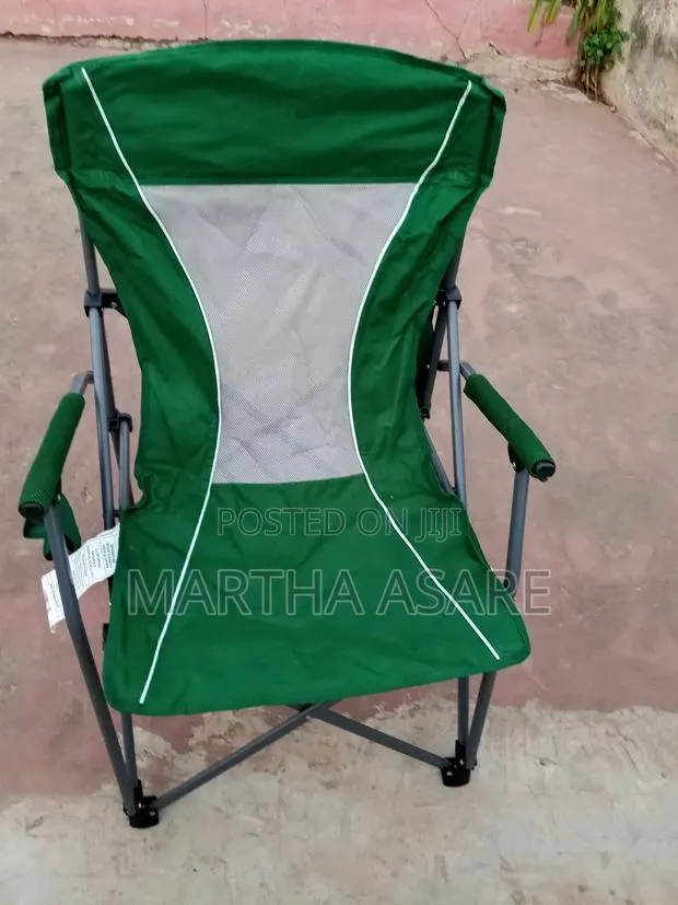 A Green Folding Portable Camping Chair With Hard Armrests,. · Photo 1