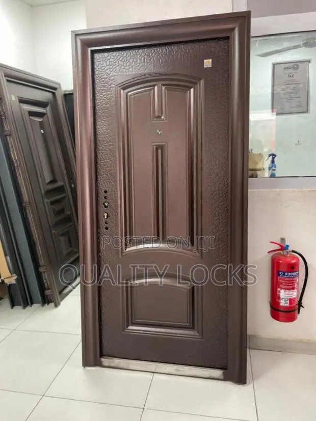 Quality Locks Outside Open Metal Door · Photo 1