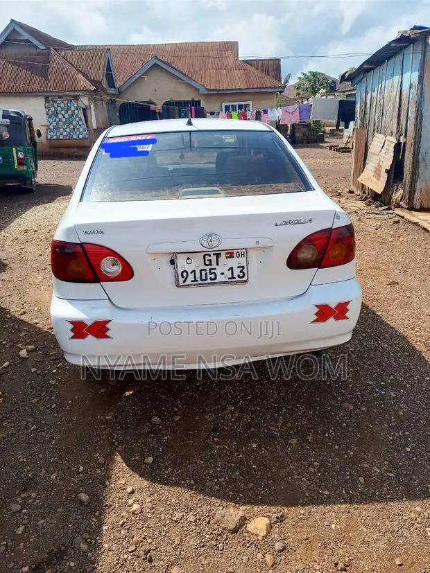 Toyota Corolla 2007 White · Photo 1