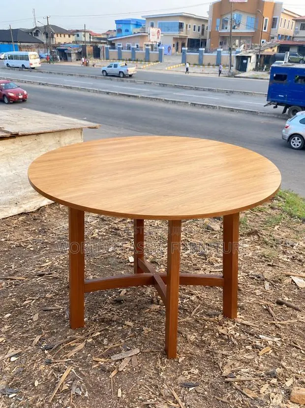 Round Wooden Dining Table · Photo 1