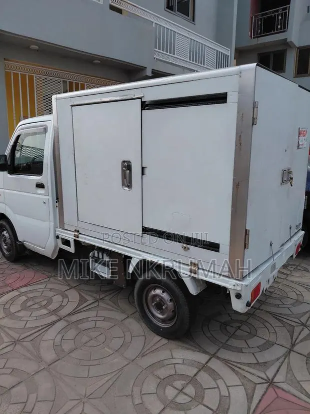 Suzuki Super Carry 2011 White · Photo 1