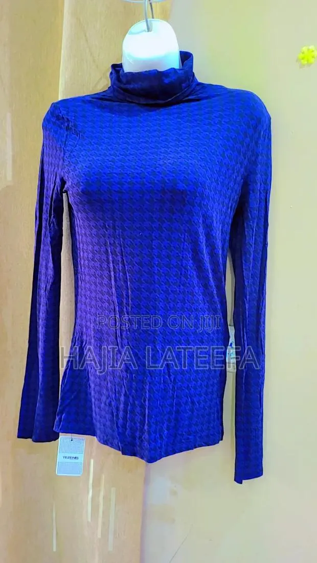 Unisex Cool Turtle Neck Top · Photo 1