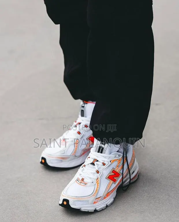 New Balance 740 Orange Blanche - Sport · Photo 1