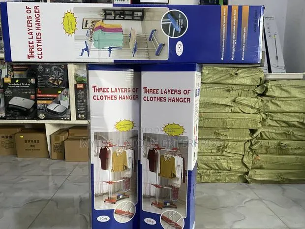 Standing Laundry Rack 4 Tier-Wheels+Foldable · Photo 1