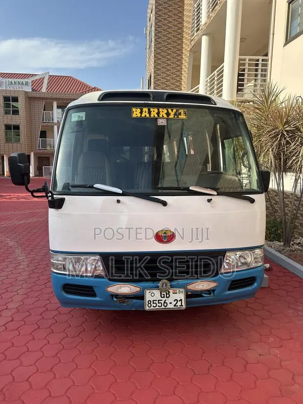 Toyota Coaster 2012 White · Photo 1