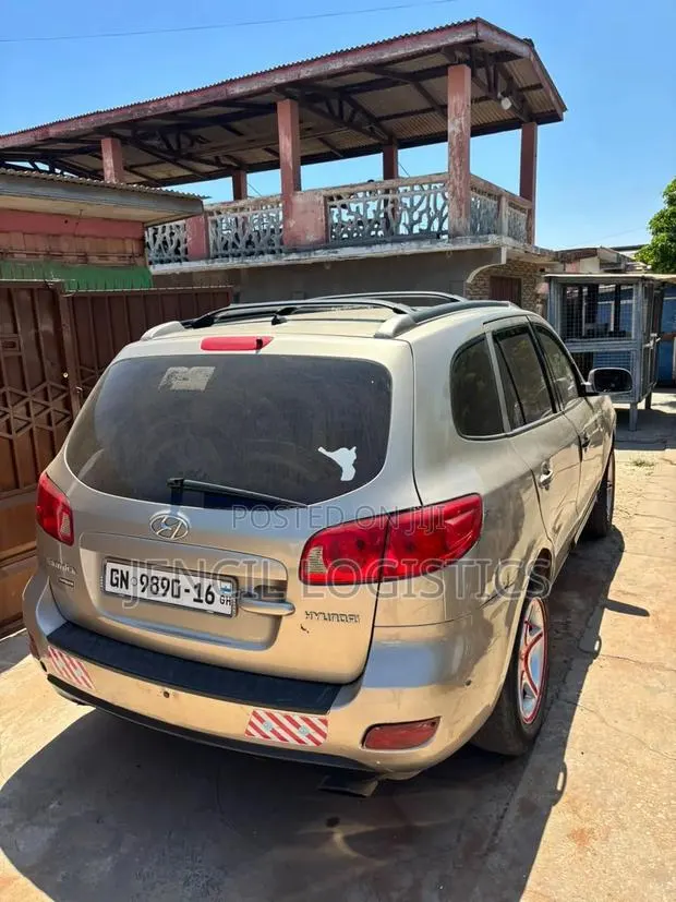 Hyundai Santa Fe 2010 Gold · Photo 1