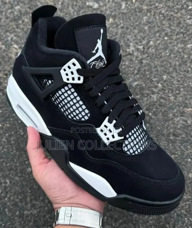 Jordan 4 Thunder White · Photo 1