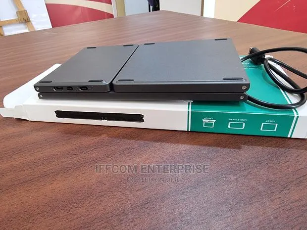 Bluetooth Rechargeable Foldable Keyboard/Mouse · Photo 1