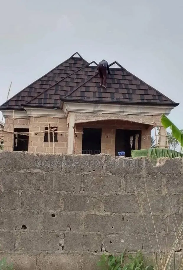 Stone Coated Roofing Sheets — 50 Years Guarantee of Quality · Photo 1
