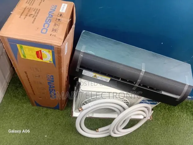 Nasco 1.5hp Mirror Air Conditioner – Cool Without Limits · Photo 1